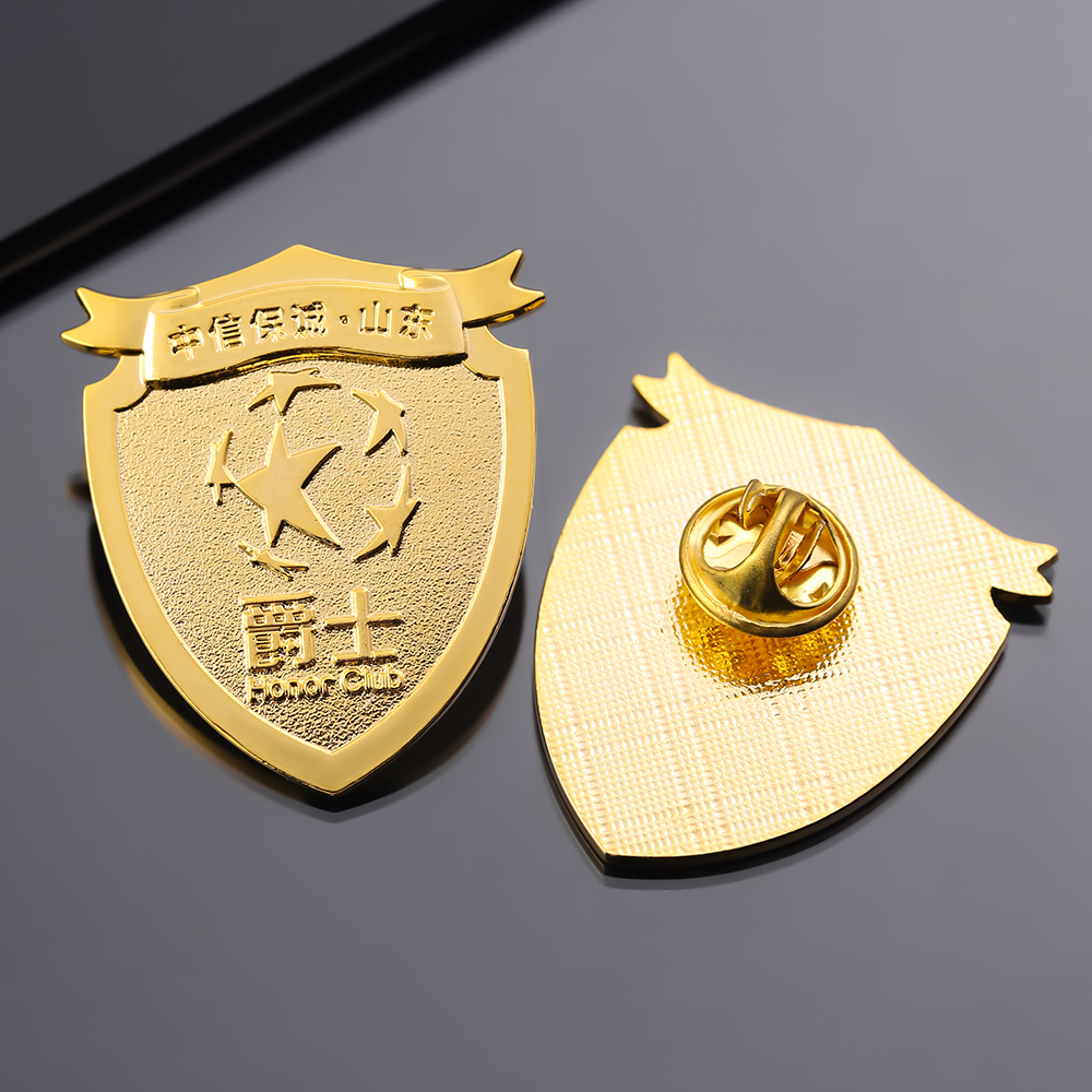 Die Struck Metal Shield Gold Pin with Sandblast Background